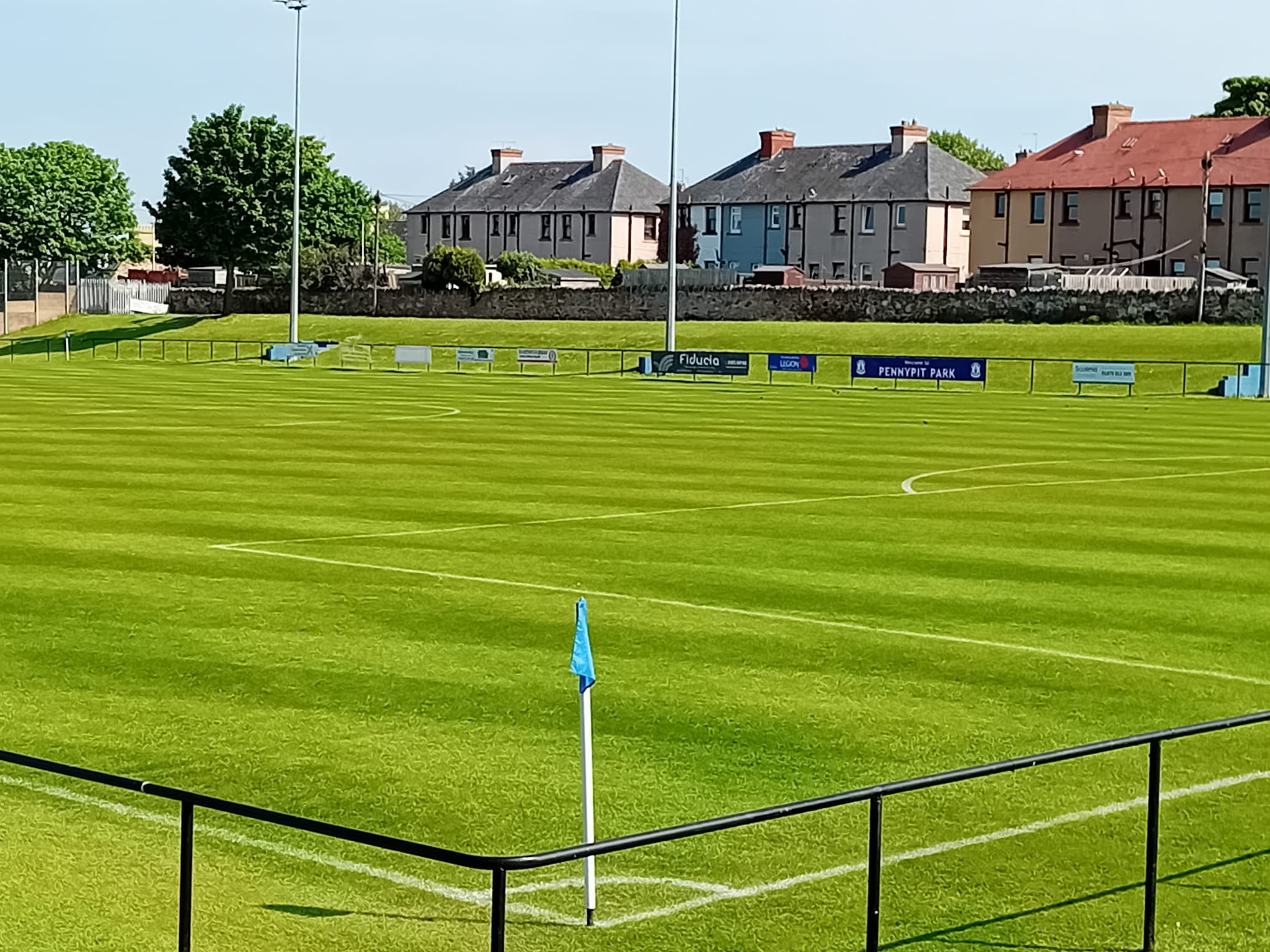 The Pennypit pitch and the Welcome to Pennypit Park board in Prestonpans